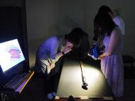 三次元測定作業をしている3人が写っている写真