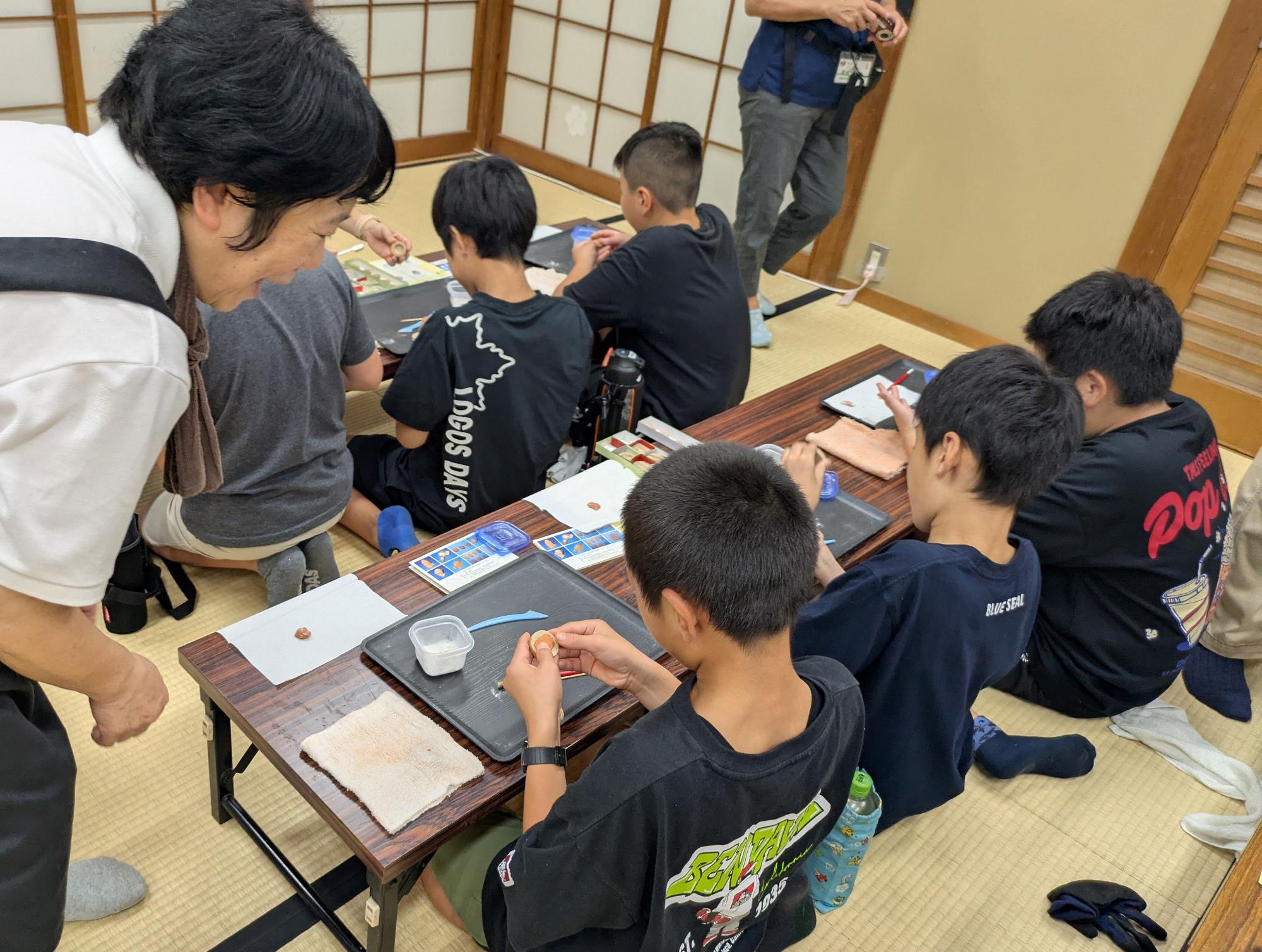 泥めんこづくり体験